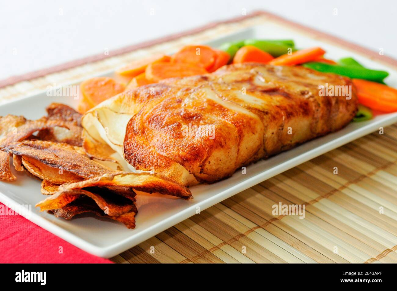 halibut fish fillets wrapped in potato Stock Photo Alamy