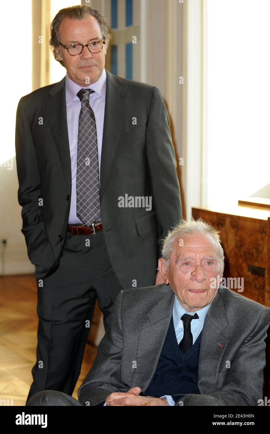 Michel Leeb and Robert Lamoureux posing at Paris City Hall in Paris, France on March 31, 2009. Robert Lamoureux received the medal of 'Medaille de La Ville de Paris' from Paris mayor Bertrand Delanoe at the Hotel de Ville in Paris, France on March 31, 2009. Photo by Thierry Orban/ABACAPRESS.COM Stock Photo