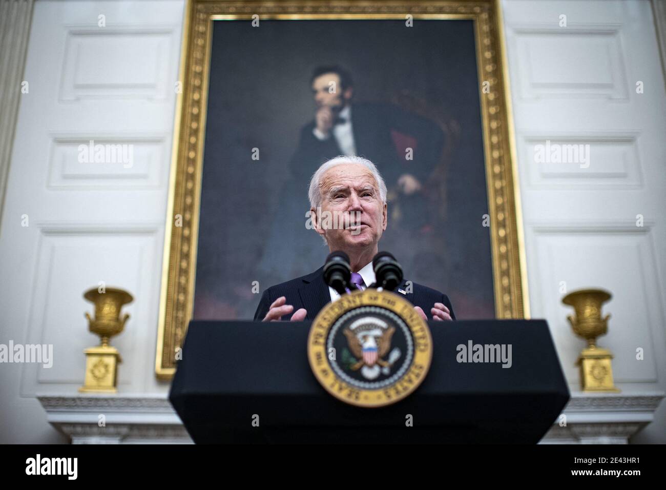 U.S. President Joe Biden speaks on his administrationâÂ€Â™s Covid-19 response in the State Dining Room of the White House in Washington, D.C., U.S., on Thursday, Jan. 21, 2021. Biden in his first full day in office plans to issue a sweeping set of executive orders to tackle the raging Covid-19 pandemic that will rapidly reverse or refashion many of his predecessor's most heavily criticized policies. Photo by Al Drago/Pool/ABACAPRESS.COM Stock Photo