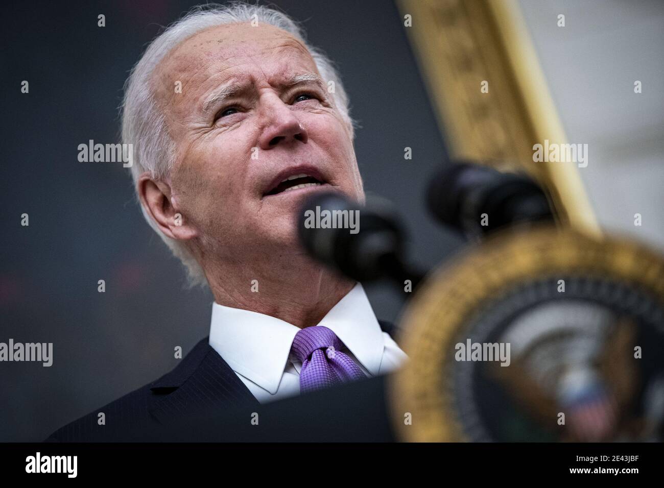 Washington, United States. 21st Jan, 2021. U.S. President Joe Biden speaks on his administration's Covid-19 response in the State Dining Room of the White House in Washington, DC, U.S., on Thursday, Jan. 21, 2021. Biden in his first full day in office plans to issue a sweeping set of executive orders to tackle the raging Covid-19 pandemic that will rapidly reverse or refashion many of his predecessor's most heavily criticized policies. Photo by Al Drago/UPI Credit: UPI/Alamy Live News Stock Photo