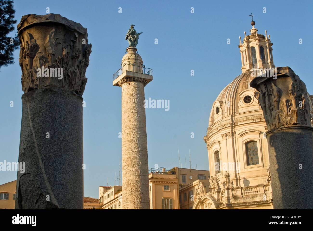 Trajan's Forum: Trajan's Column and Santissimo Nome di Maria al Foro Traiano church. Rome, Italy Stock Photo