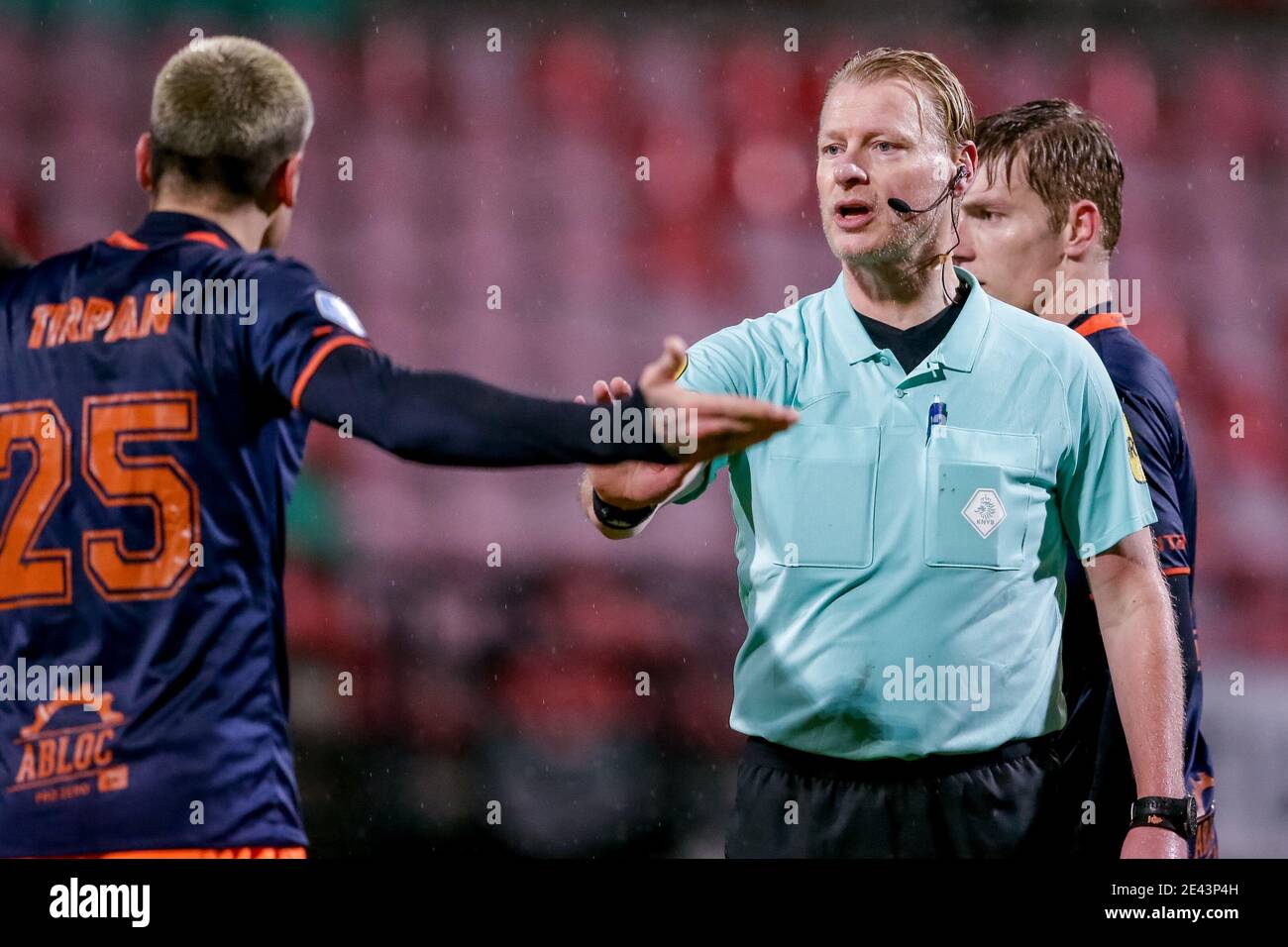 NIJMEGEN, NETHERLANDS - JANUARY 21: (L-R): Mickael Sylvian Tirpan of Fortuna Sittard  in argument with Referee Kevin Blom during the Dutch KNVB Cup ma Stock Photo