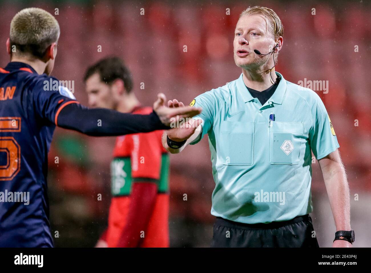 NIJMEGEN, NETHERLANDS - JANUARY 21: (L-R): Mickael Sylvian Tirpan of Fortuna Sittard  in argument with Referee Kevin Blom during the Dutch KNVB Cup ma Stock Photo