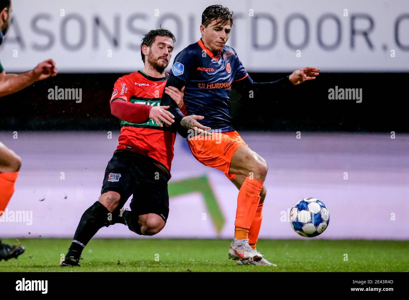 NIJMEGEN, NETHERLANDS - JANUARY 21: (L-R): Jordy Bruijn of NEC, Lazaros Rota of Fortuna Sittard during the Dutch KNVB Cup match between NEC and Fortun Stock Photo