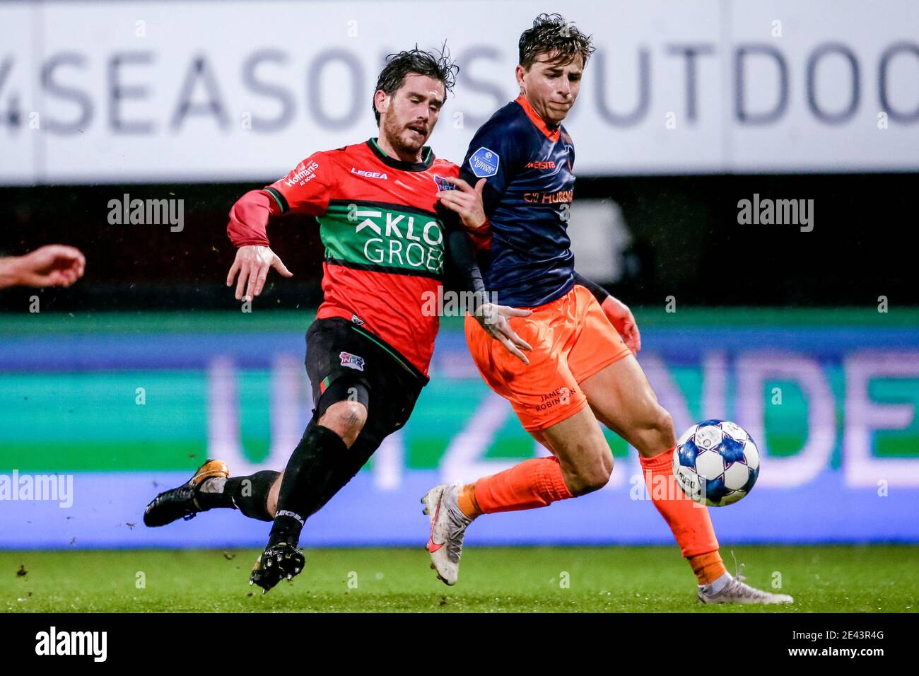 NIJMEGEN, NETHERLANDS - JANUARY 21: (L-R): Jordy Bruijn of NEC, Lazaros Rota of Fortuna Sittard during the Dutch KNVB Cup match between NEC and Fortun Stock Photo