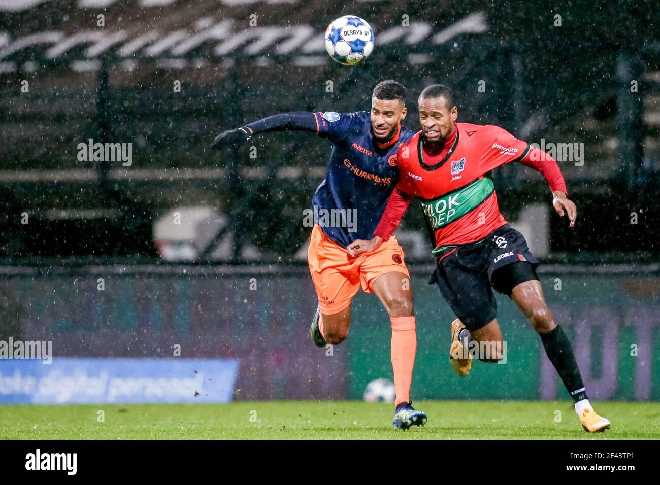 NIJMEGEN, NETHERLANDS - JANUARY 21: (L-R): Martin Yves Angha of Fortuna Sittard, Rangelo Janga of NEC during the Dutch KNVB Cup match between NEC and Stock Photo
