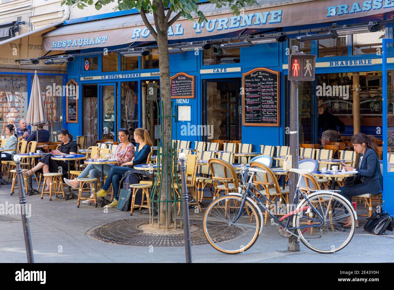 Outdoor seating at Cafe Le Royal Turenne in the Marais, Paris, France Stock Photo