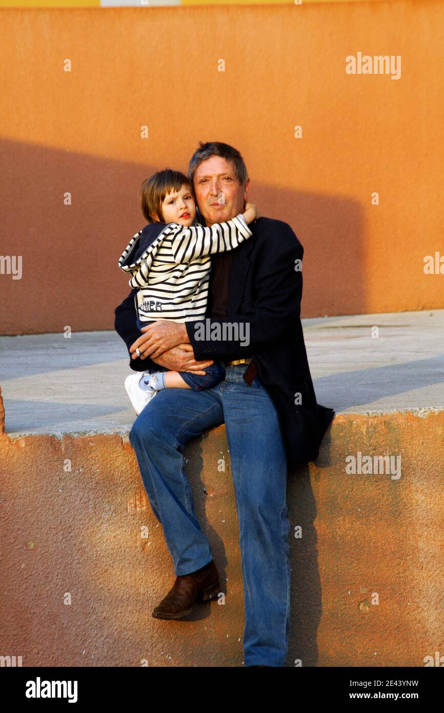 Frenchman Jean-Michel Andre and his 3-year-old daughter Elise pose as they  arrive in Marseille, southern France on April 14, 2009. The young girl, who  was kidnapped last month while walking with her