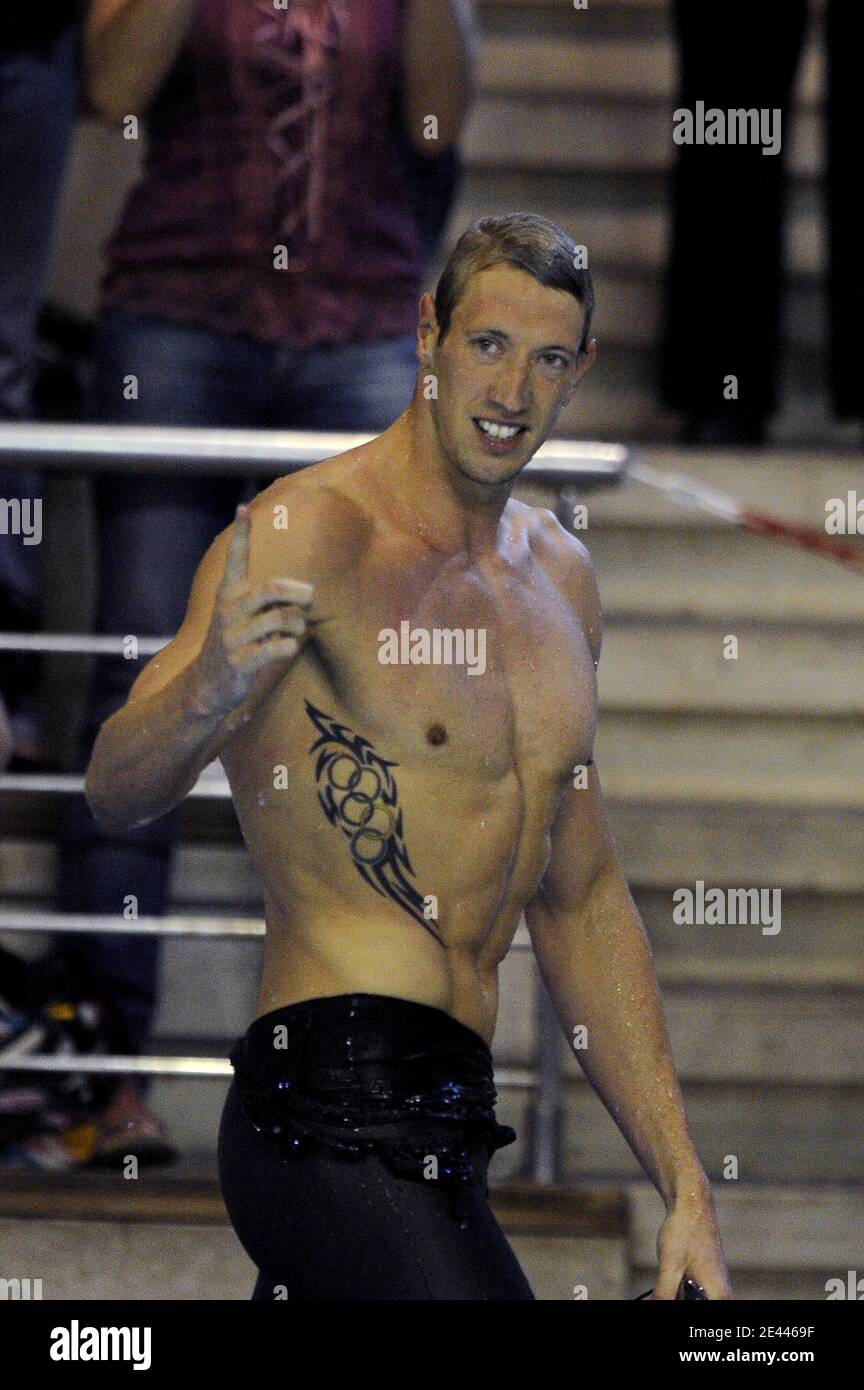 French swimmer Alain Bernard celebrates after scoring a new world