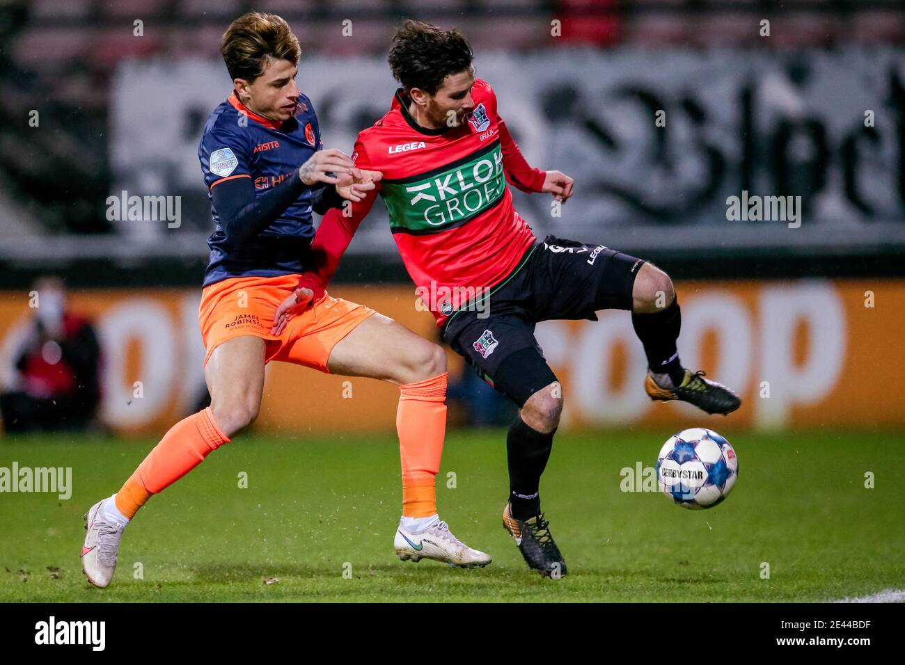 NIJMEGEN, NETHERLANDS - JANUARY 21: (L-R): Lazaros Rota of Fortuna Sittard, Jordy Bruijn of NEC during the Dutch KNVB Cup match between NEC and Fortun Stock Photo