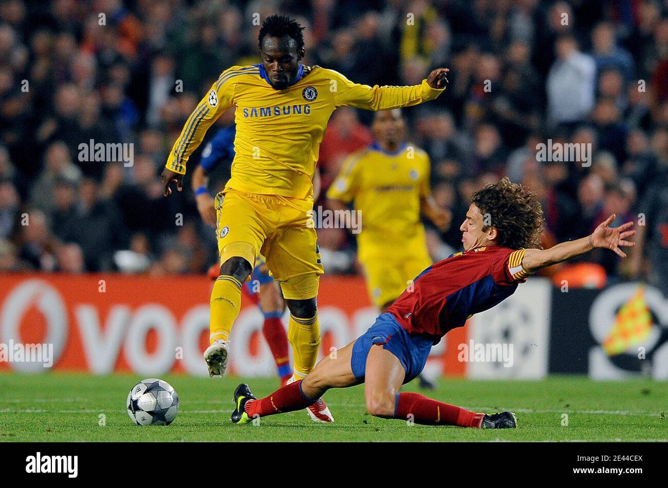 Chelsea S Michael Essien Is Tackled By Fc Barcelona S Carles Puyol During The Uefa Champions League Semi Final First Leg Barcelona Vs Chelsea At The Nou Camp Stadium In Barcelona Spain On April
