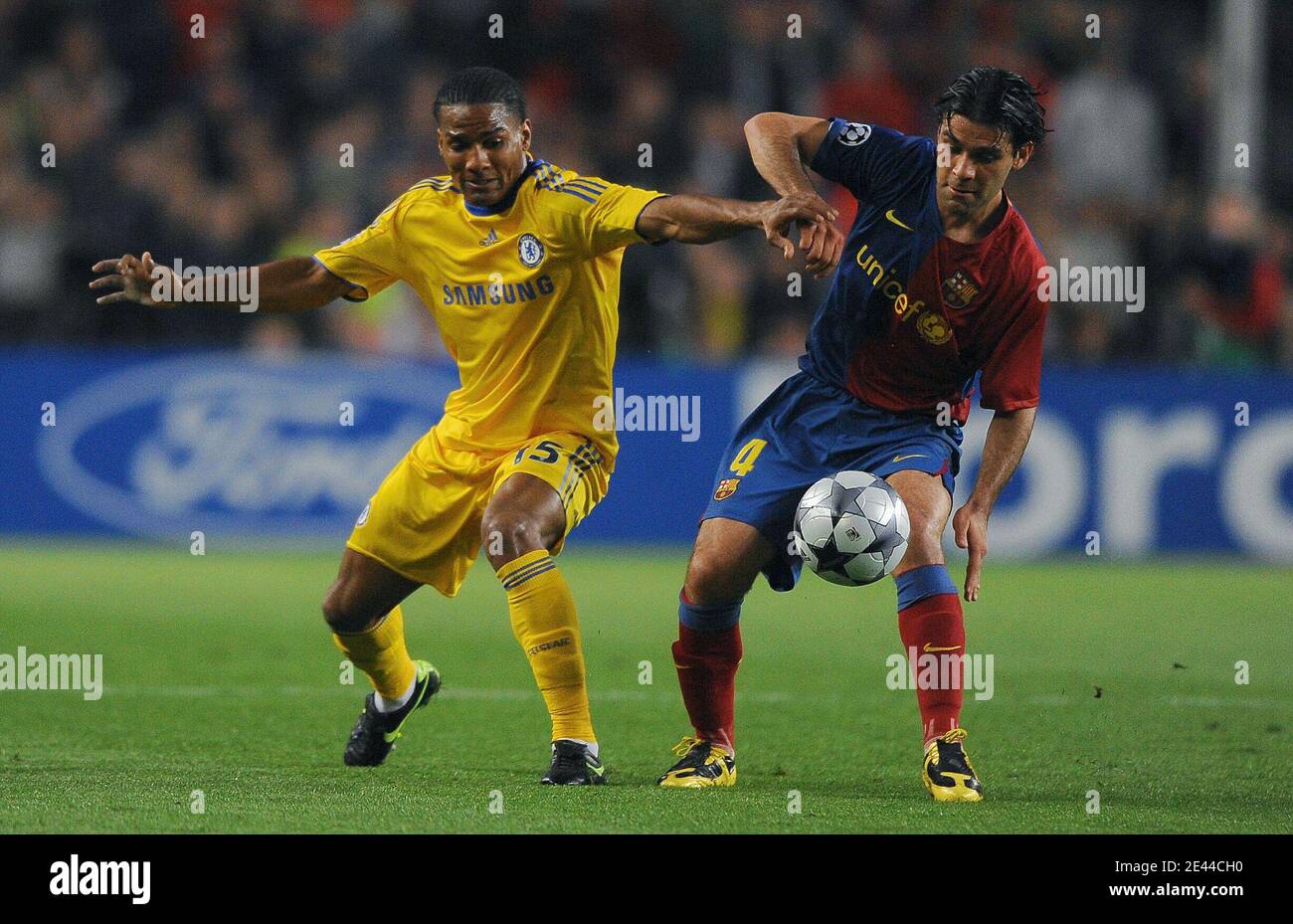 Chelsea S Florent Malouda And Fc Barcelona S Rafael Marquez Battles For The Ball During The Uefa Champions League Semi Final First Leg Barcelona Vs Chelsea At The Nou Camp Stadium In Barcelona Spain