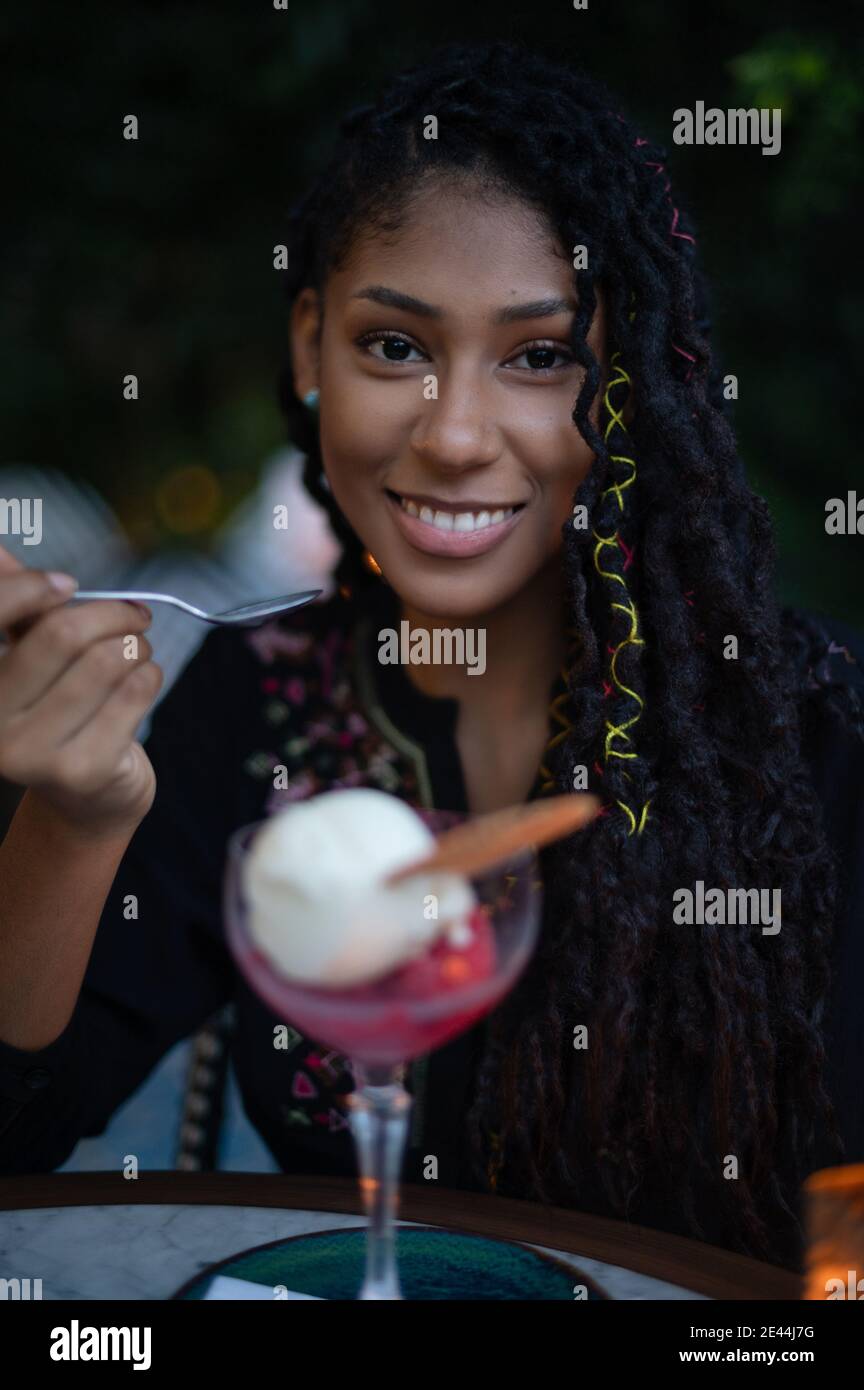 Happy Young Latina Woman Red Sitting Stock Photo 2331187637 | Shutterstock, image size:864x1390