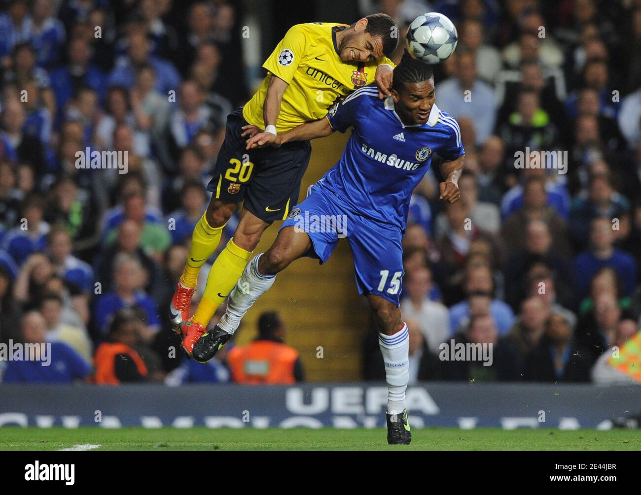 Barcelona S Daniel Alves Challenges With His Head Chelsea S Florent Malouda In Air During The Uefa Champions League Soccer Match Semi Final Second Leg Chelsea Vs Barcelona At The Stamford Bridge Stadium In
