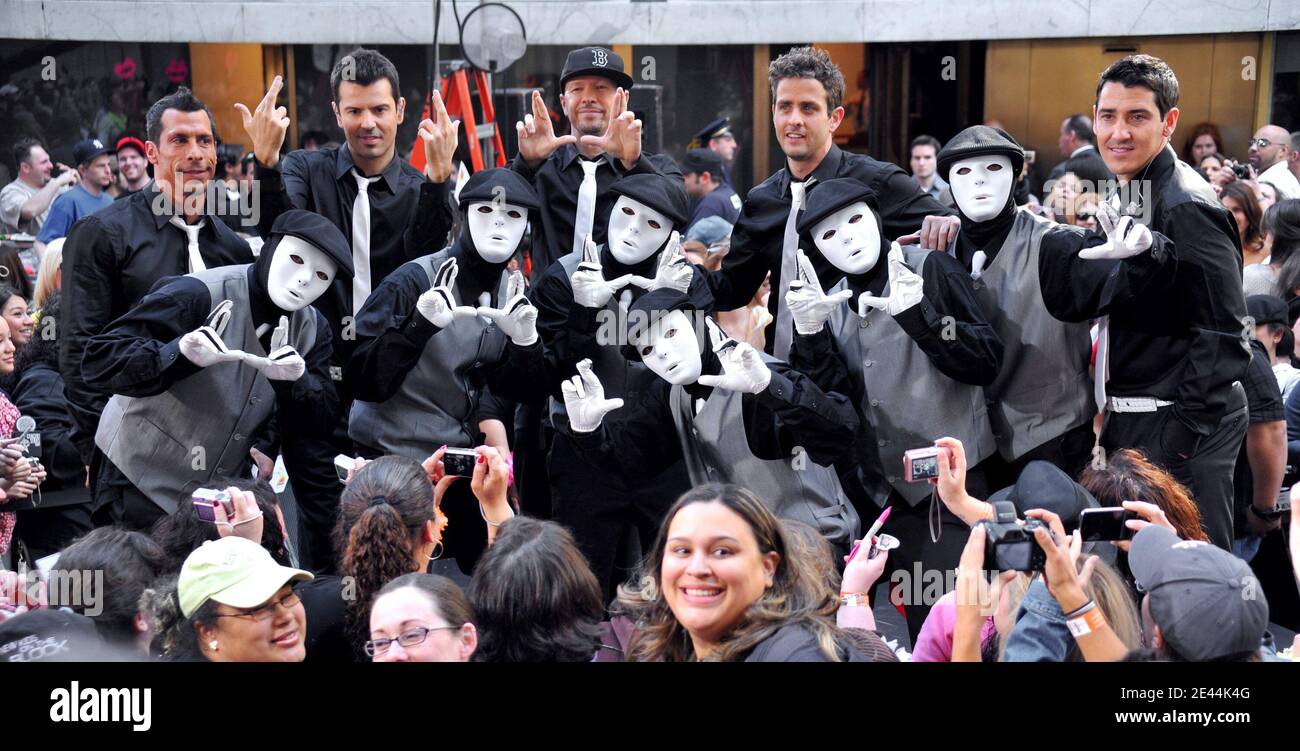 (L-R) Singers Danny Wood, Jordan Knight, Donnie Wahlberg, Joey McIntyre, and Jonathan Knight of New Kids On The Block perform with America Best Dance Crew Season 1 Champions Jabbawockeez on NBC's 'Today' Show Concert Series at Rockefeller Plaza in New York City, NY, USA on May 8, 2009. Photo by Gregorio Binuya/ABACAPRESS.COM (Pictured: Danny Wood, Jordan Knight, Donnie Wahlberg, Joey McIntyre, Jonathan Knight, New Kids On The Block, Jabbawockeez) Stock Photo