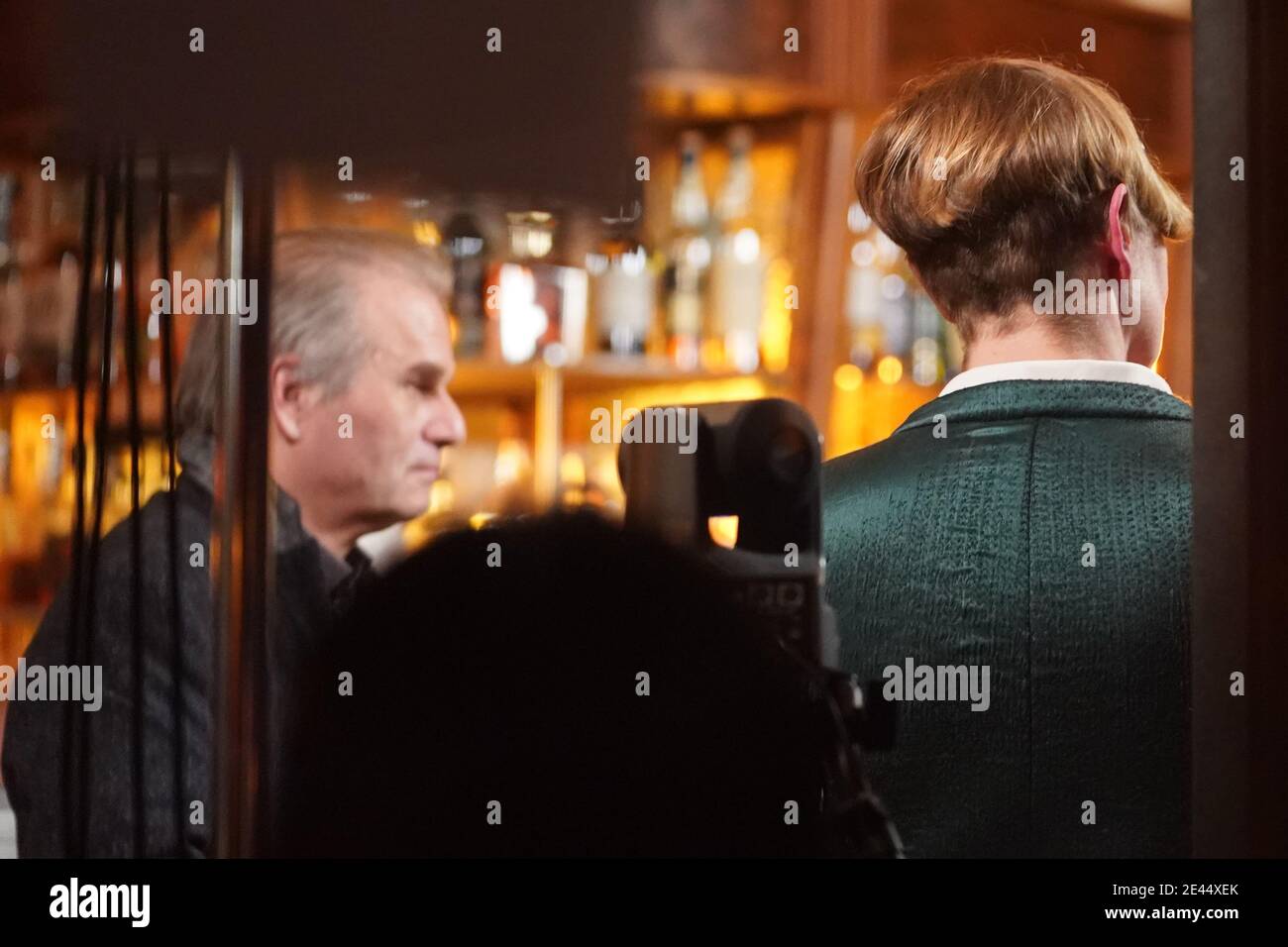 Berlin, Germany. 21st Jan, 2021. Lawyers Reiner Füllmich and Viviane  Fischer attend a party founding event at the "Scotch and Sofa" bar in  Prenzlauer Berg. A week after police were called in