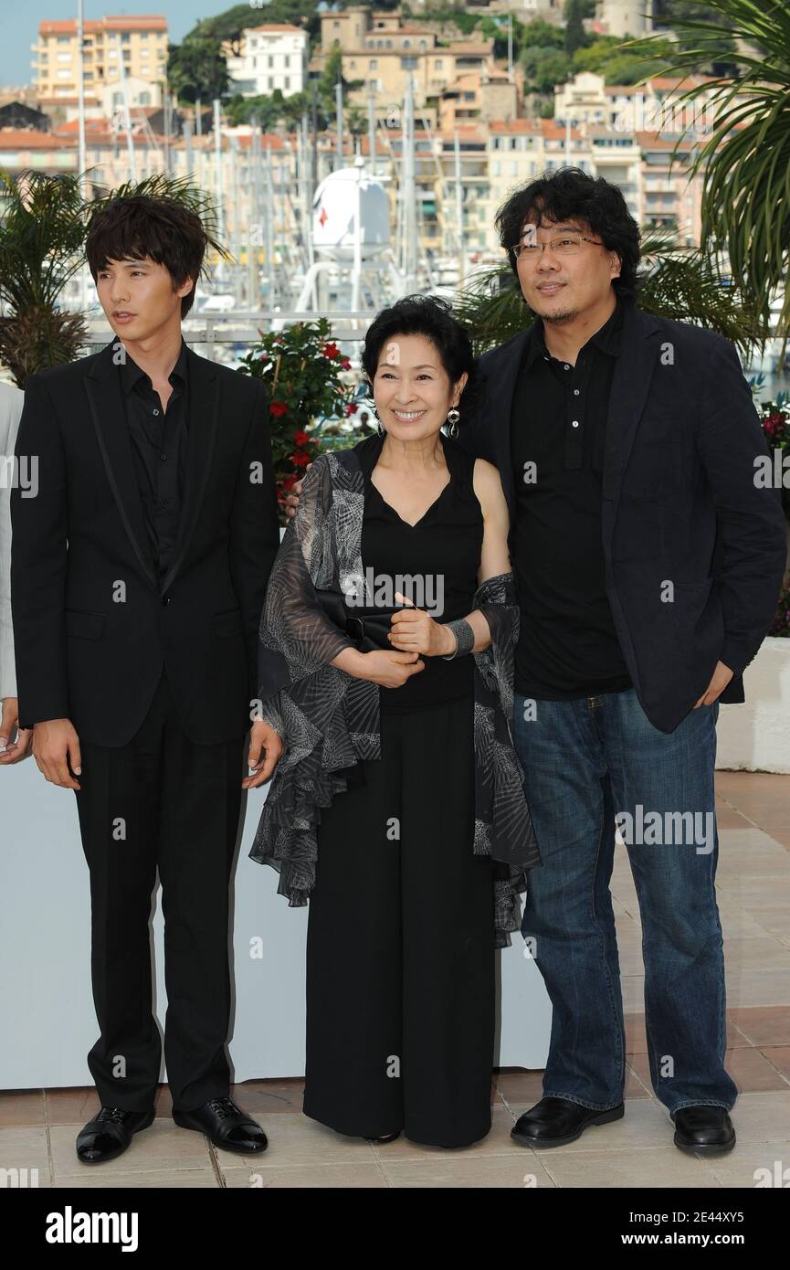 Won Bin, Actress Kim Hye-Ja and director Bong Joon Ho attend the 'Mother' Photocall held at the Palais Des Festival during the 62nd International Cannes Film Festival in Cannes, France on May 16, 2009. Photo by Nebinger-Orban/ABACAPRESS.COM Stock Photo