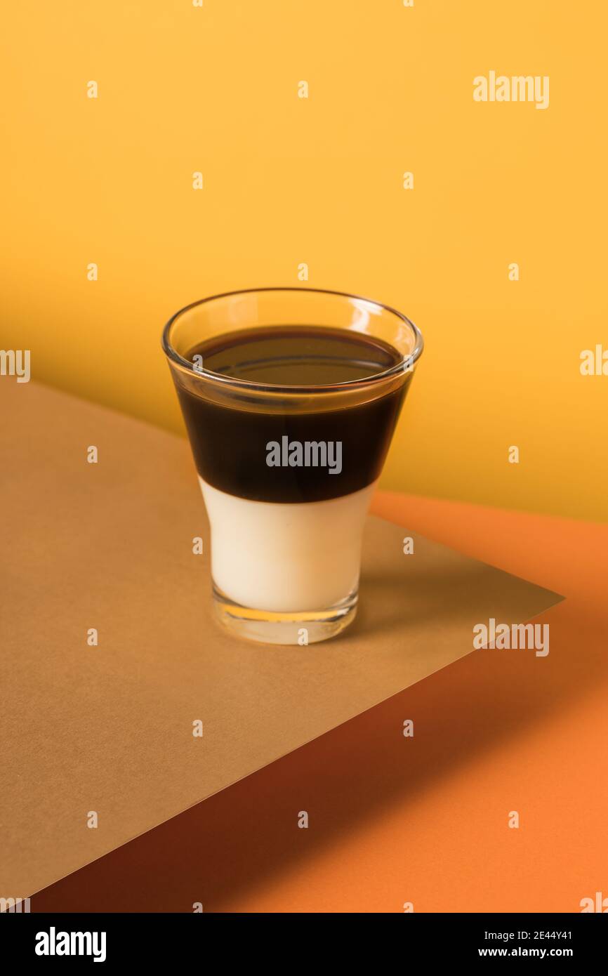 Layered coffee Bombon drink with espresso and sweetened condensed milk