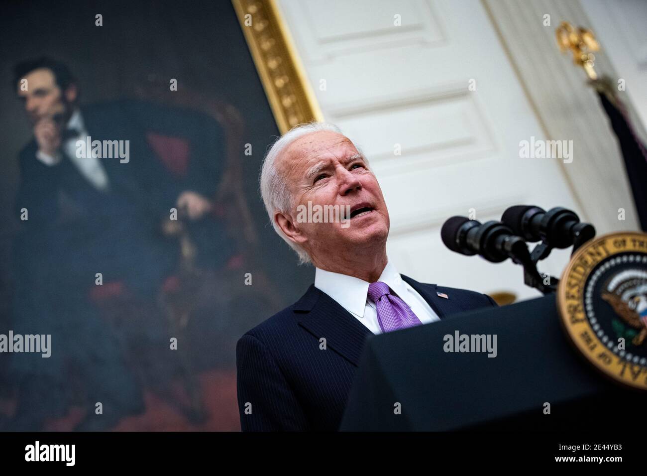U.S. President Joe Biden speaks on his administration's Covid-19 response in the State Dining Room of the White House in Washington, DC, U.S., on Thursday, Jan. 21, 2021. Biden in his first full day in office plans to issue a sweeping set of executive orders to tackle the raging Covid-19 pandemic that will rapidly reverse or refashion many of his predecessor's most heavily criticized policies. Credit: Al Drago/Pool via CNP /MediaPunch Stock Photo