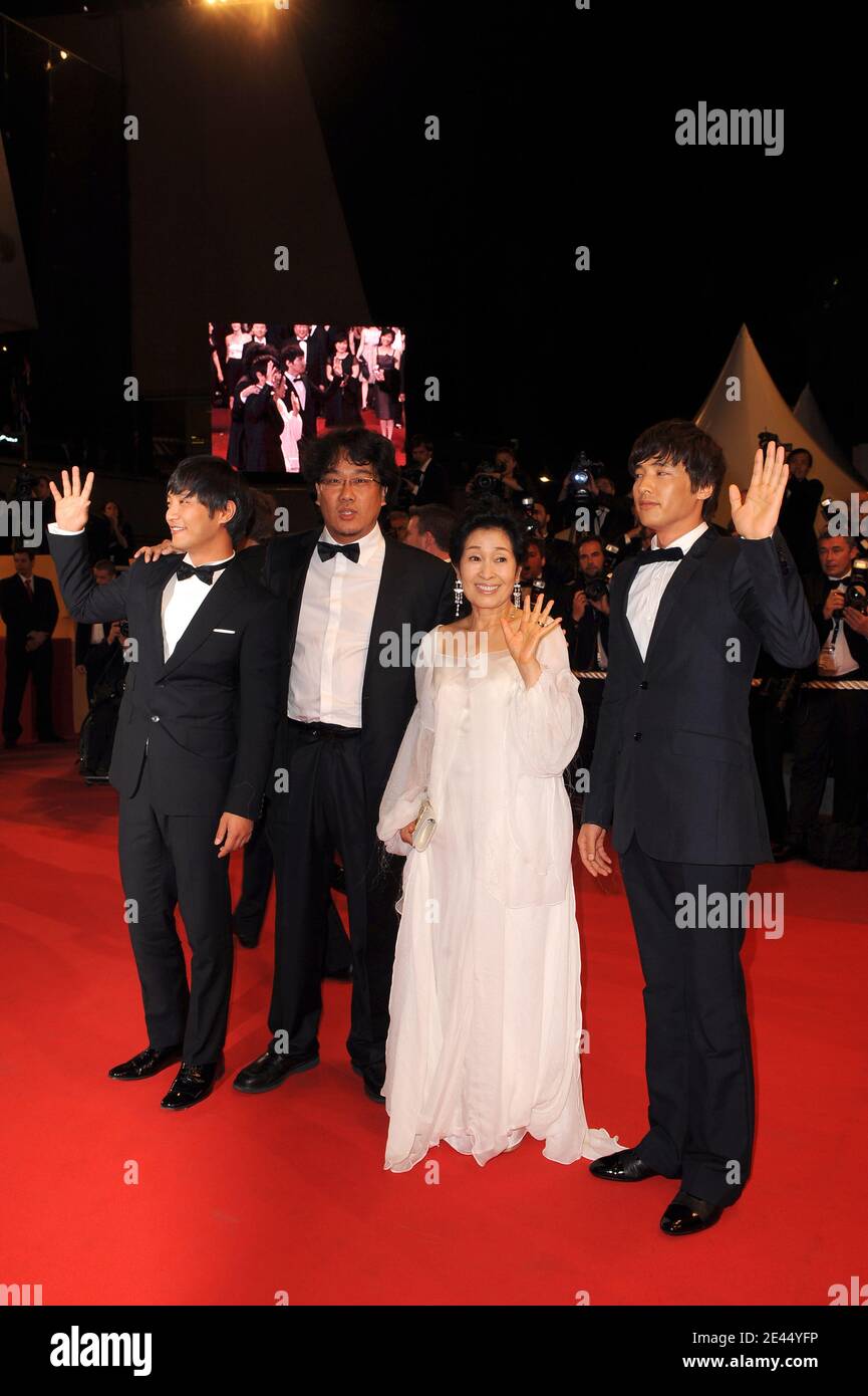 Actor Jin Goo and Actress Kim Hye-Ja with actor Won Bin and Director Bong Joon Ho arriving to the screening of 'Taking Woodstock' during the 62nd Cannes Film Festival at the Palais des Festivals in Cannes, France on May 16, 2009. Photo by Nebinger-Orban/ABACAPRESS.COM Stock Photo