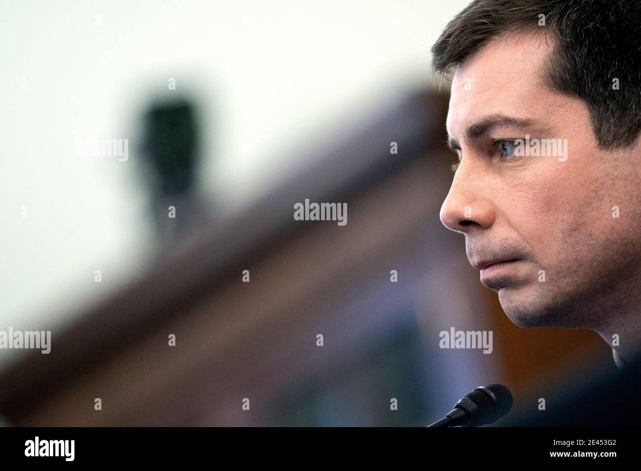 Washington, DC, USA. 21st Jan, 2021. Pete Buttigieg, U.S. secretary of transportation nominee for U.S. President Joe Biden, listens during a Senate Commerce, Science and Transportation Committee confirmation hearing in Washington, DC, U.S., on Thursday, Jan. 21, 2021. Buttigieg, is pledging to carry out the administration's ambitious agenda to rebuild the n sation's infrastructure, calling it a 'generational opportunity' to create new jobs, fight economic inequality and stem climate change. Credit: Stefani Reynolds/Pool via CNP | usage worldwide Credit: dpa/Alamy Live News Stock Photo