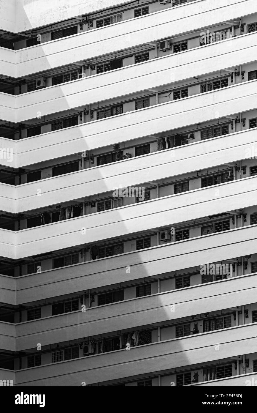 Vertical shot of a modern white building with ba Stock Photo - Alamy