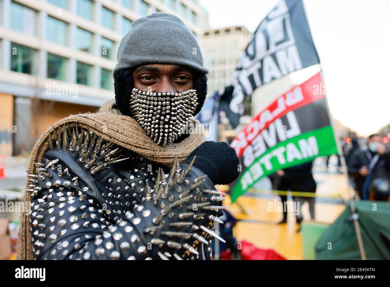 Washington, Columbia, USA. 20th Jan, 2020. Smokey Sims celebrates at Black Lives Matter Plaza after the departure of Donald J. Trump's helicopter at the white house on the inauguration day President Joe Biden and Vice President Kamala Harris. Credit: Jeremy Hogan/SOPA Images/ZUMA Wire/Alamy Live News Stock Photo