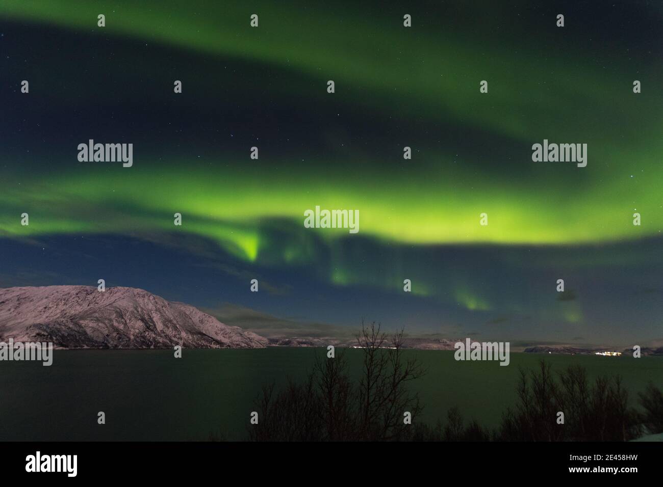 Norther lights dancing over Alta in northern Norway Stock Photo