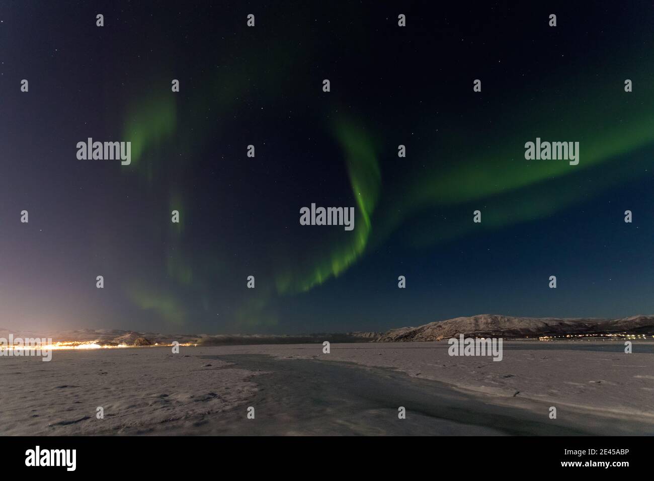 Norther lights dancing over Alta in Finnmark Norway Stock Photo