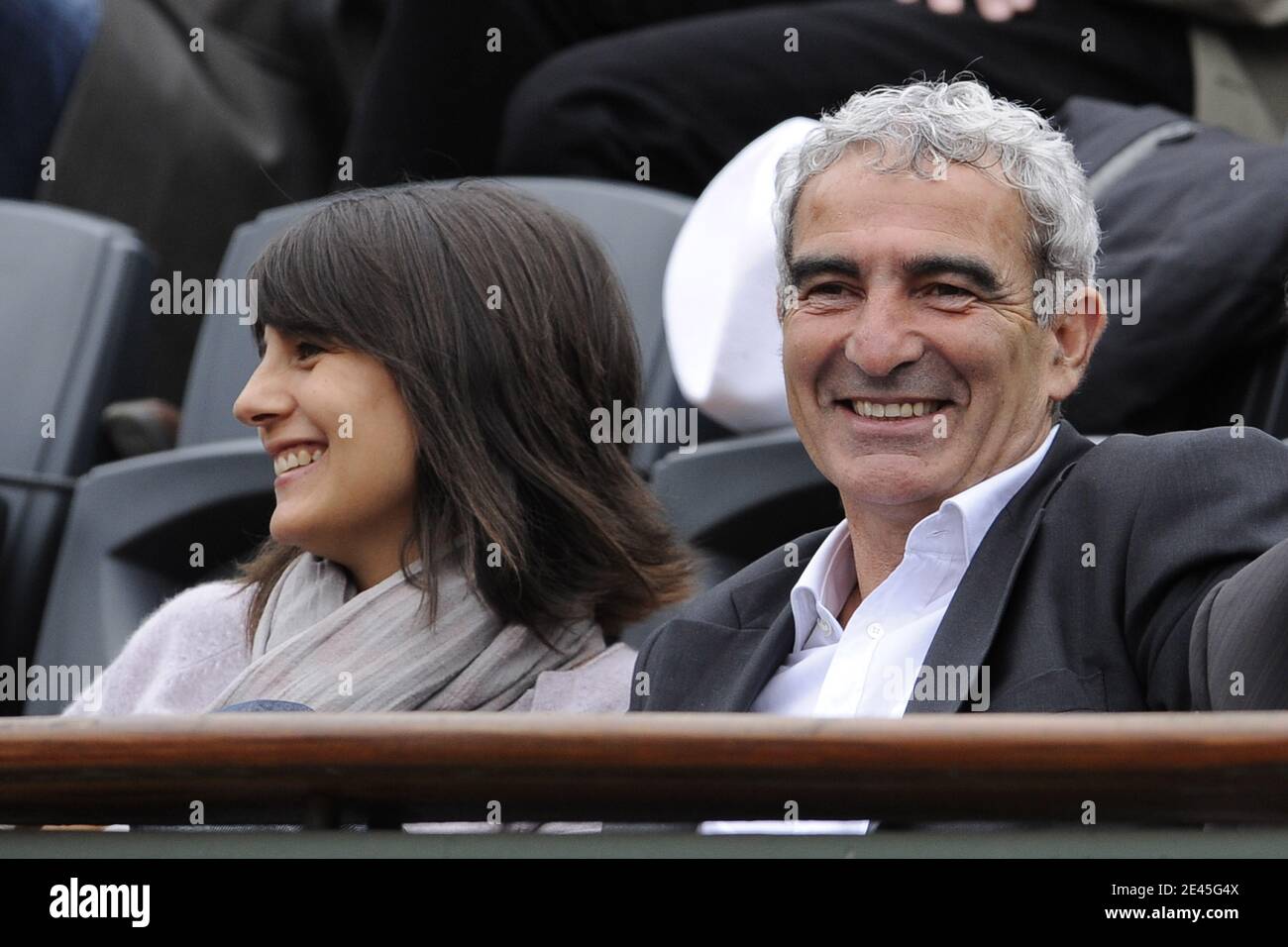 Raymond Domenech And Estelle Denis Watching Switzerland S Roger Federer Returns The Ball To Argentina S Jose Acasuso In Their Second Round Match Of The French Open Tennis Tournament At The Roland Garros Stadium
