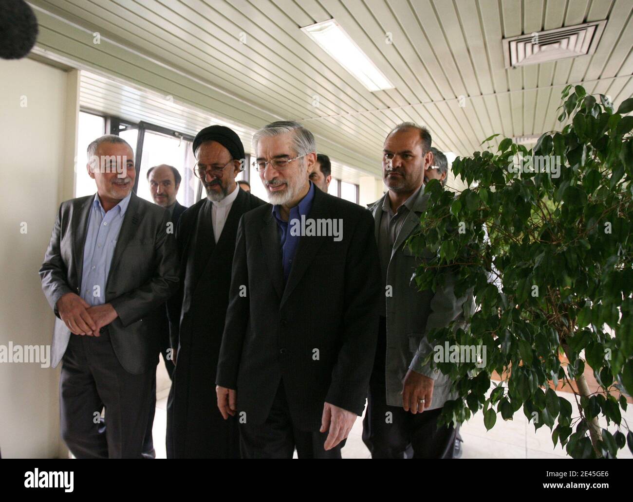 Iranian reformist presidential candidate Mir Hossein Mousavi (2nd R) arrives for a press conference in Tehran, Iran on May 29, 2009. Mousavi, a former premier, said that he is prepared to hold talks with the international P5-plus-1 group over Iran's nuclear drive if elected, but he added that Tehran would continue its nuclear programme. Photo by Farzaneh Khademian/ABACAPRESS.COM Stock Photo