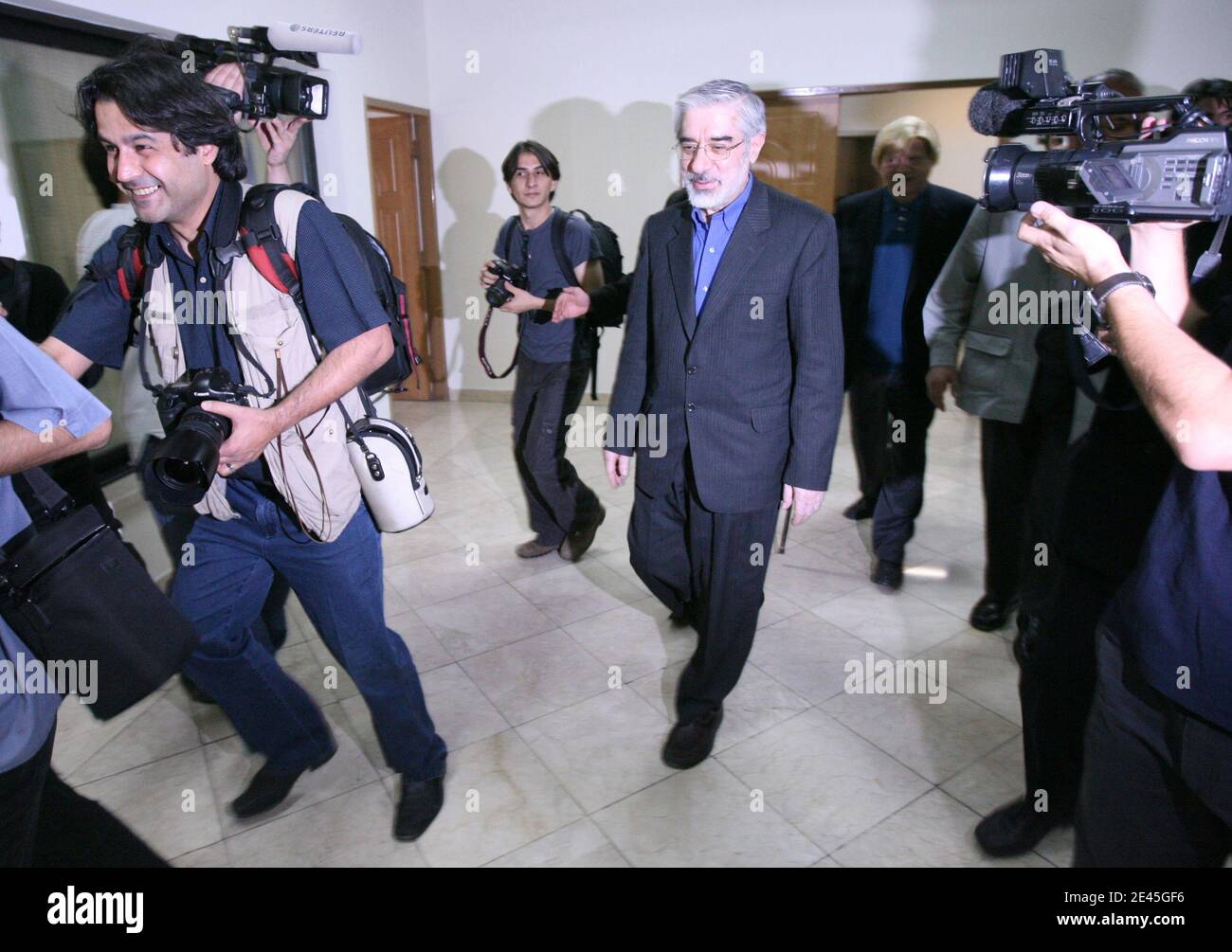 Iranian reformist presidential candidate Mir Hossein Mousavi leaves after a press conference in Tehran, Iran on May 29, 2009. Mousavi, a former premier, said that he is prepared to hold talks with the international P5-plus-1 group over Iran's nuclear drive if elected, but he added that Tehran would continue its nuclear programme. Photo by Farzaneh Khademian/ABACAPRESS.COM Stock Photo