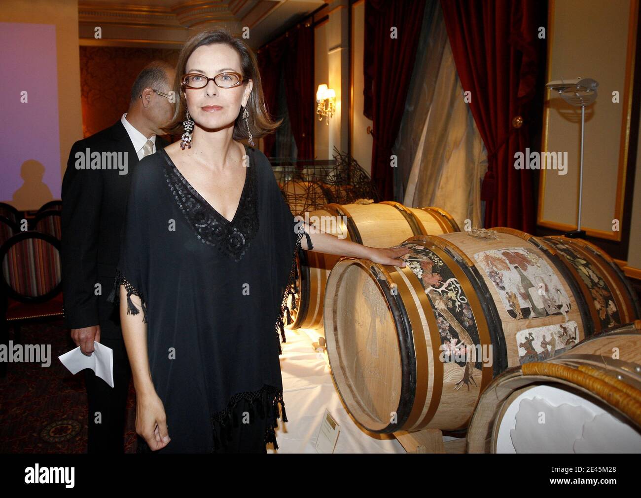 French Actress Carole Bouquet attends an wine auction to benefit charity association 'La voix de l'enfant' (The Child's Voice), in Bordeaux, southwestern France on June 2, 2009. Ten barrels manufactured from a 340-year-old oak and personalized by artists have been auctioned. Bouquet is the association's spokesperson. Photo by Patrick Bernard/ABACAPRESS.COM Stock Photo