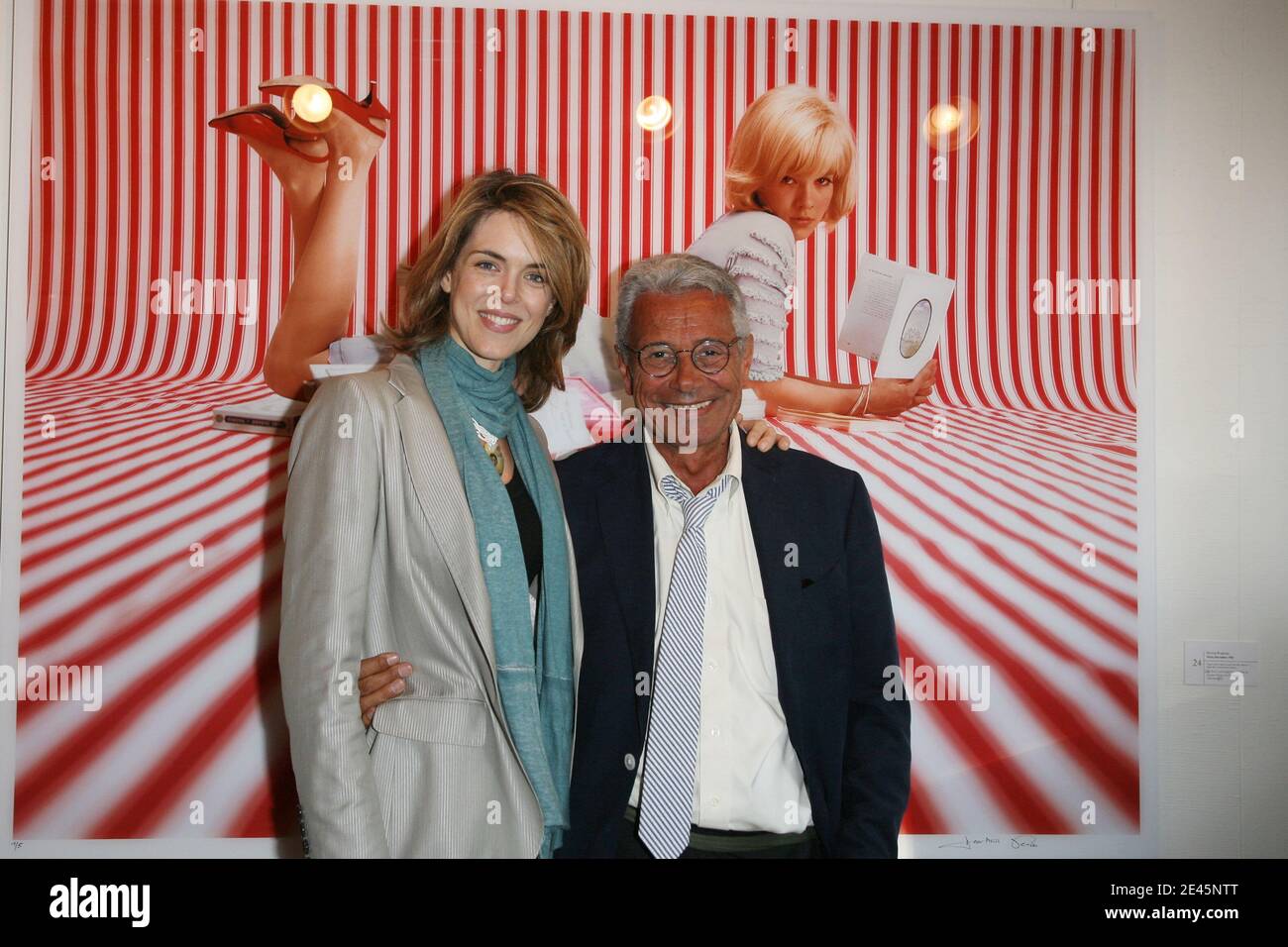 Julie Andrieu and Jean-Marie Perier attend the opening of Photographer Jean-Marie  Perier's exhibition in Paris, France on June 4, 2009. Photo by Denis  Guignebourg/ABACAPRESS.COM Stock Photo - Alamy