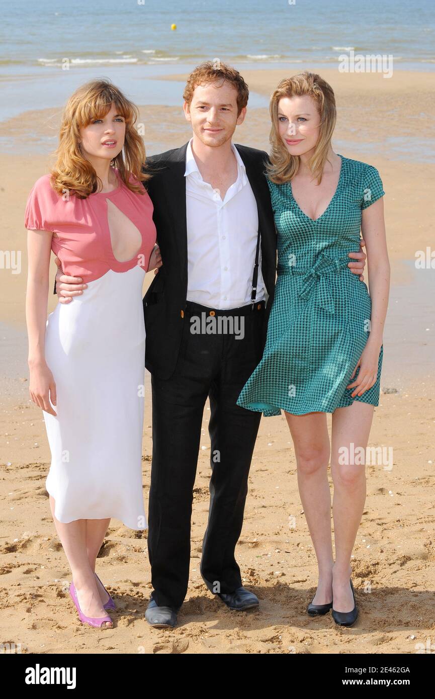 Malik Zidi, Giorgia Wurth, Cecile Cassel pose on the beach as part of the  the 23rd