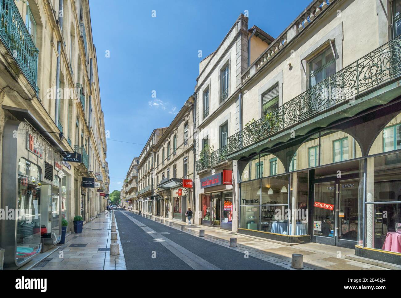 shops and botiques at Avenue du Général Perrier in the centre of Nimes, Gard department, Occitanie region, Southern France Stock Photo