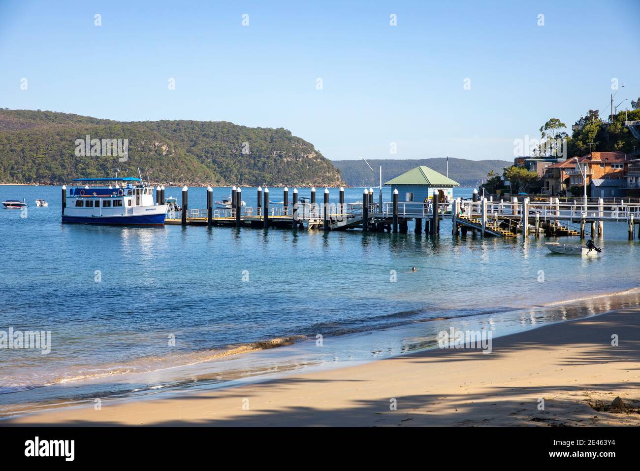 Palm Beach ferry wharf in Sydney is located on Pittwater with Ku ring Gai national park background,Sydney,Australia Stock Photo