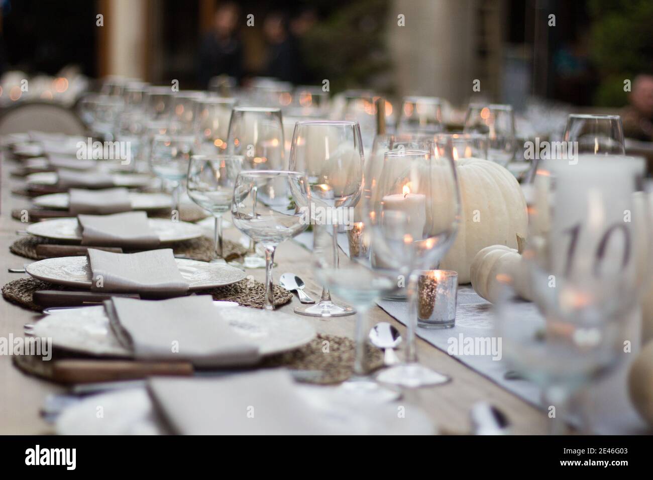 Elegant dinner table served on a garden Stock Photo