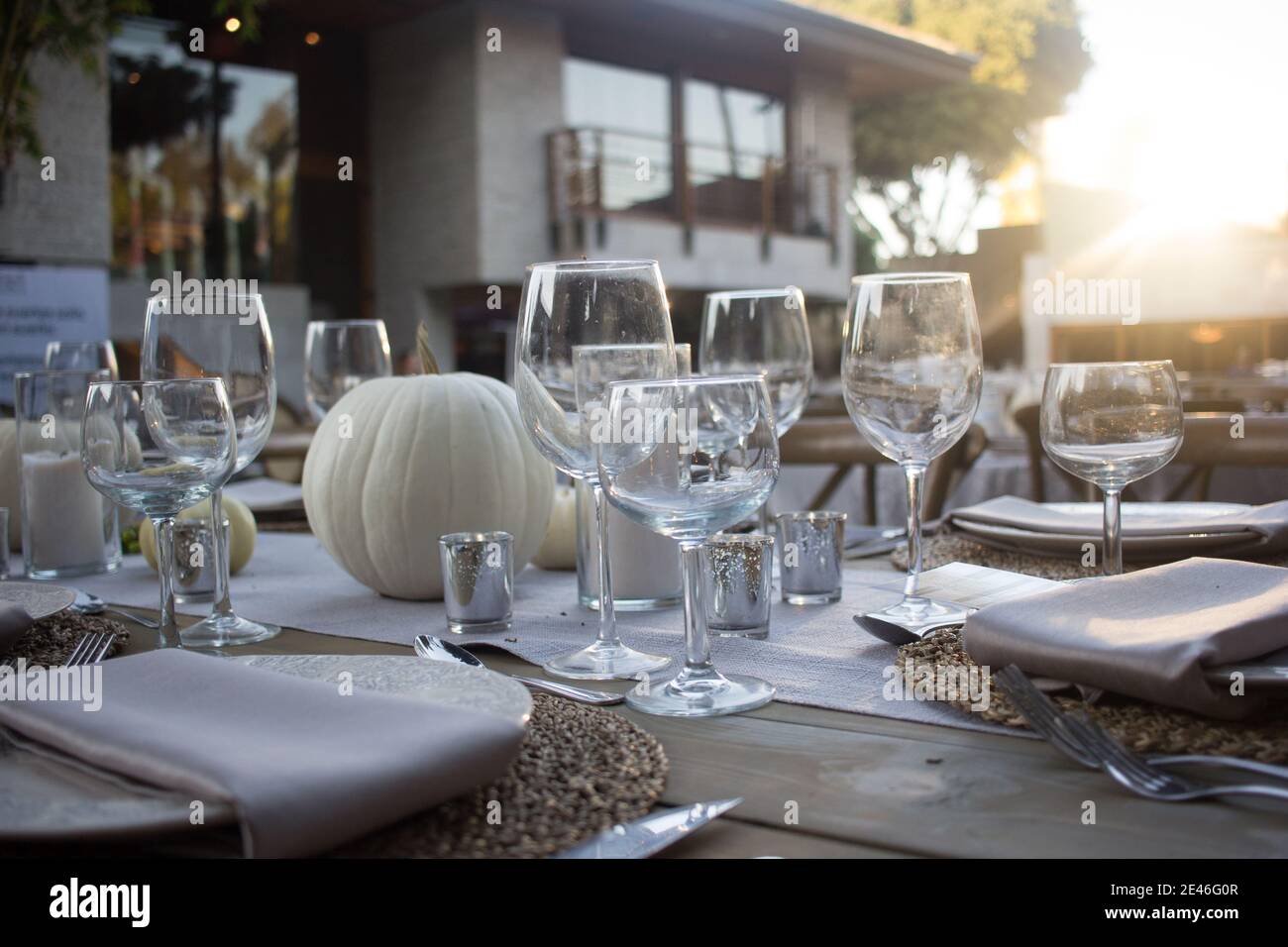 Elegant dinner table served on a garden Stock Photo