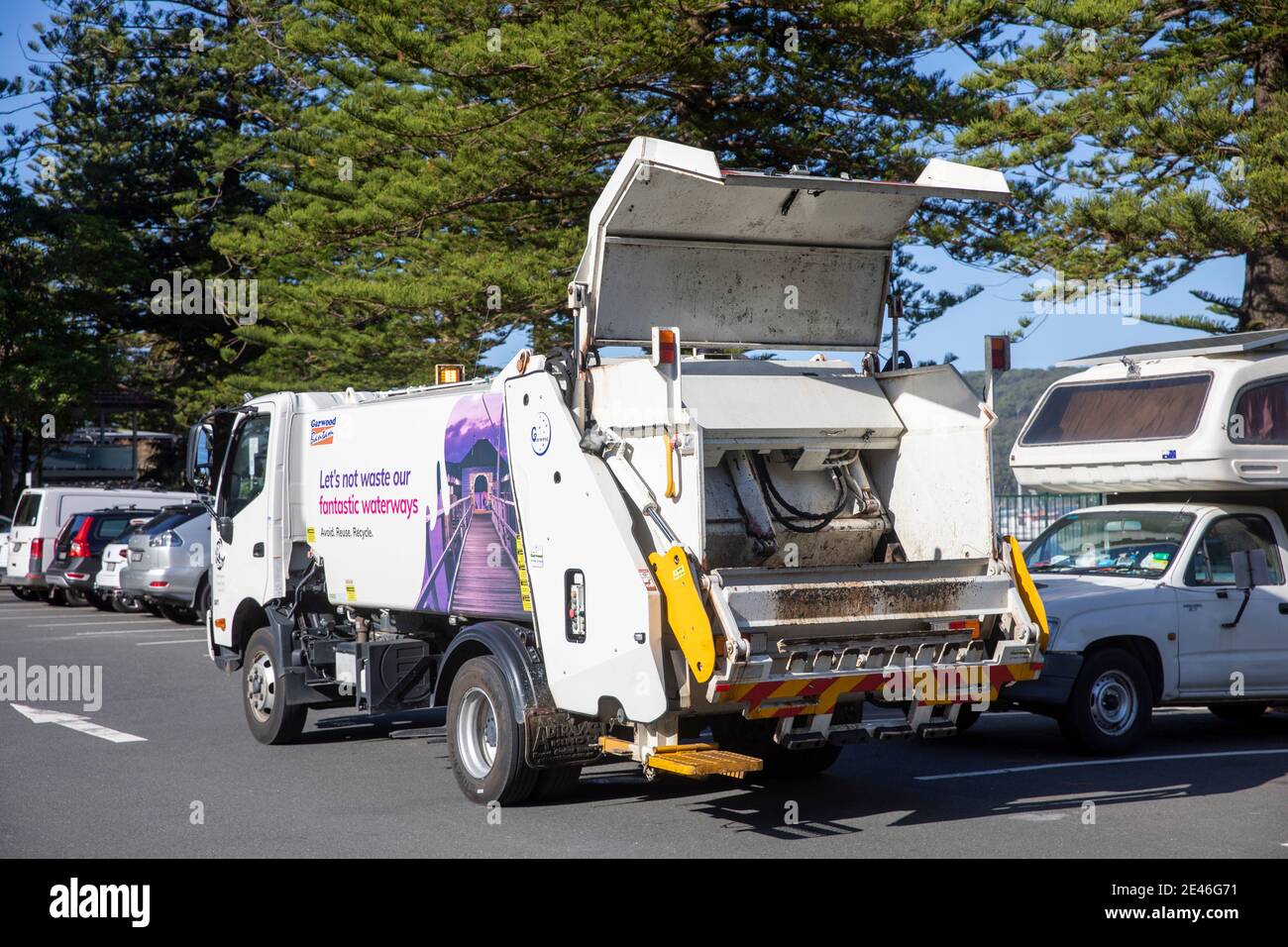 Council household waste rubbish truck garbage truck in Palm beach Sydney with message to recycle and protect waterways,Sydney,Australia Stock Photo