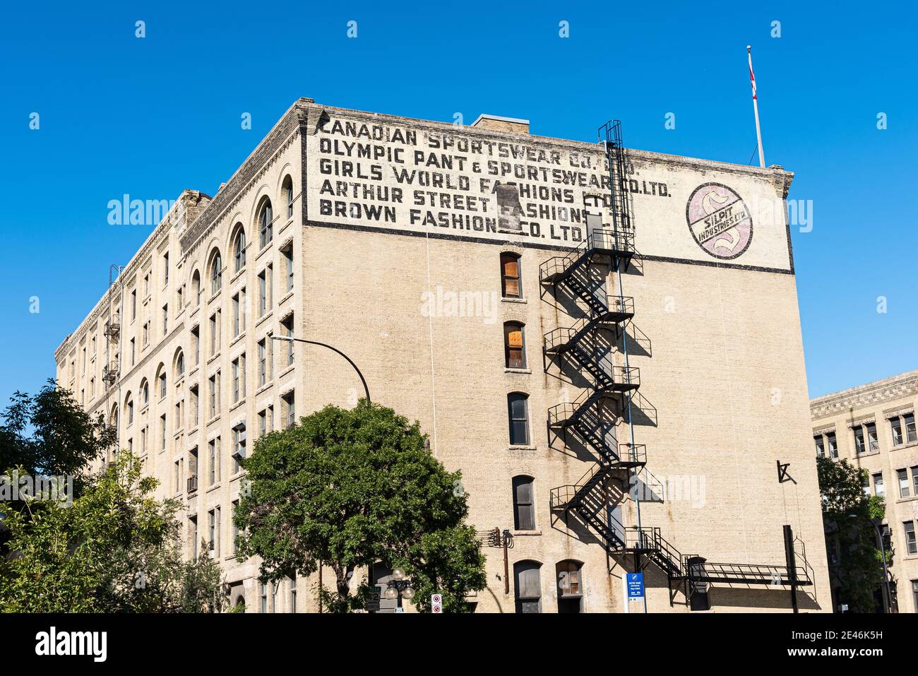 Old painted advertisements for Silpit Industries on old buildings of the center of the city of Winnipeg. Stock Photo