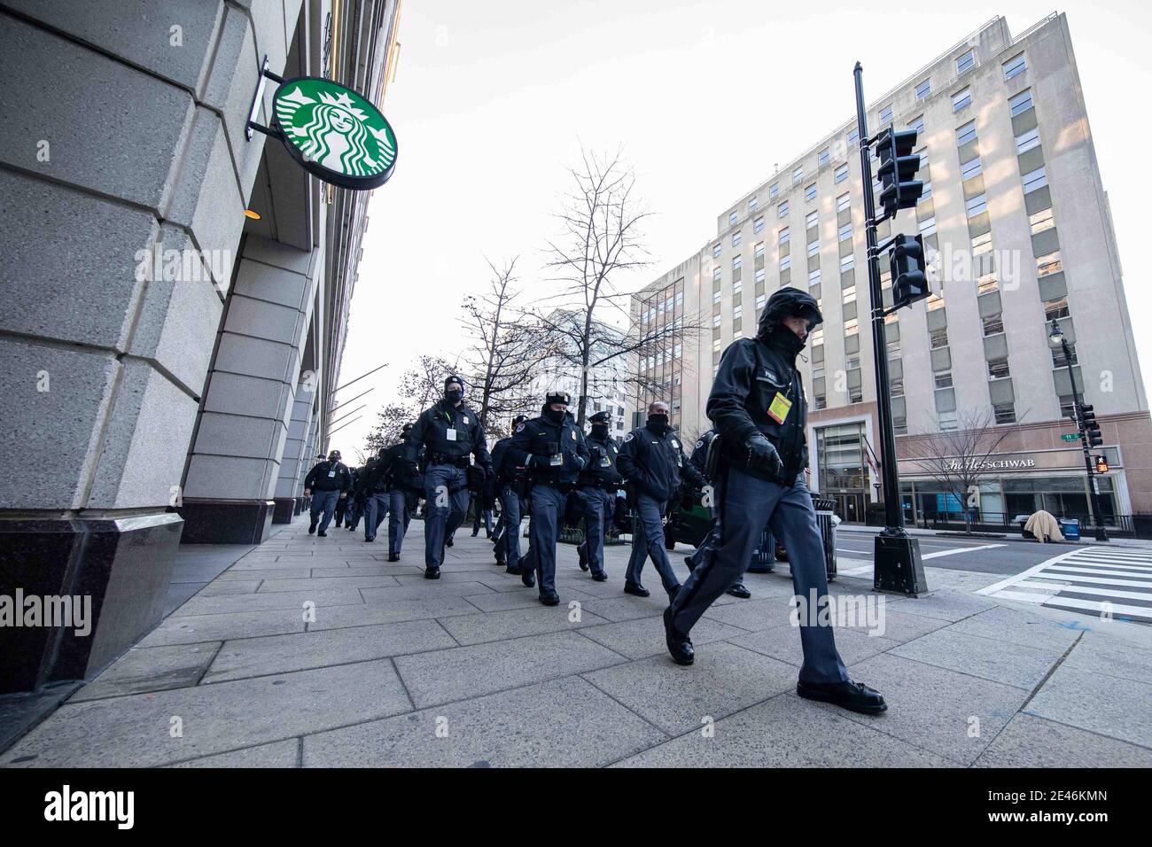 Police officers walking in formation to their destinations after ...