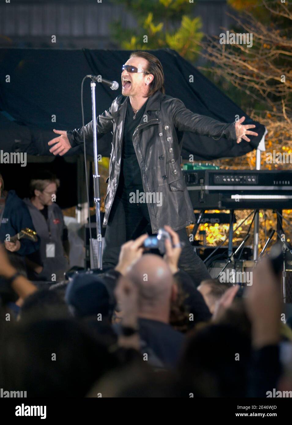 Bono and U2 perform Live from Under the Brooklyn Bridge in 2004. Stock Photo