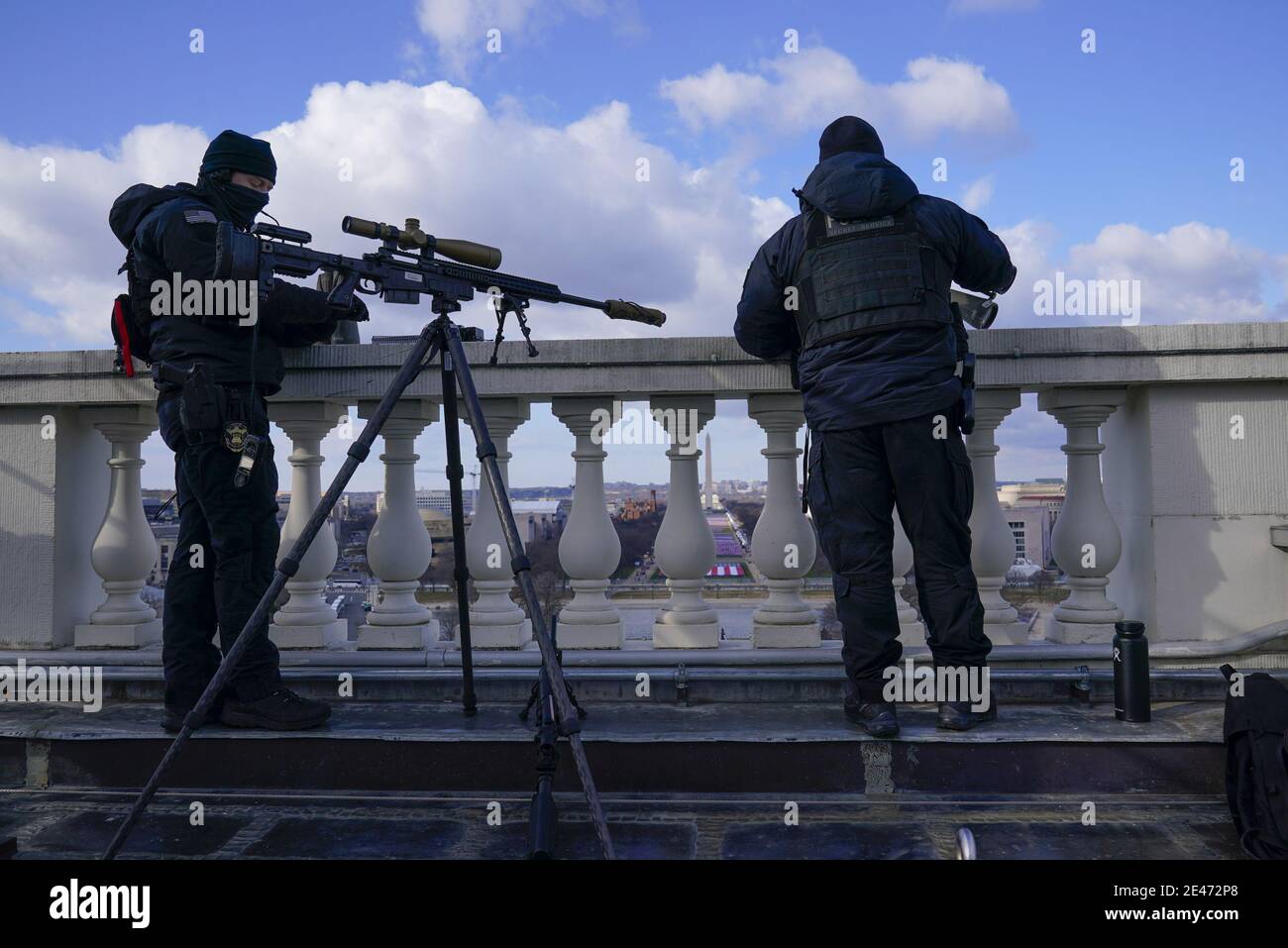 Washington, United States. 20th Jan, 2021. Law enforcement personnel monitor the National Mall area during the 59th Presidential Inauguration at the U.S. Capitol in Washington, DC on Wednesday, January 20, 2021. Pool Photo by Susan Walsh/UPI Credit: UPI/Alamy Live News Stock Photo