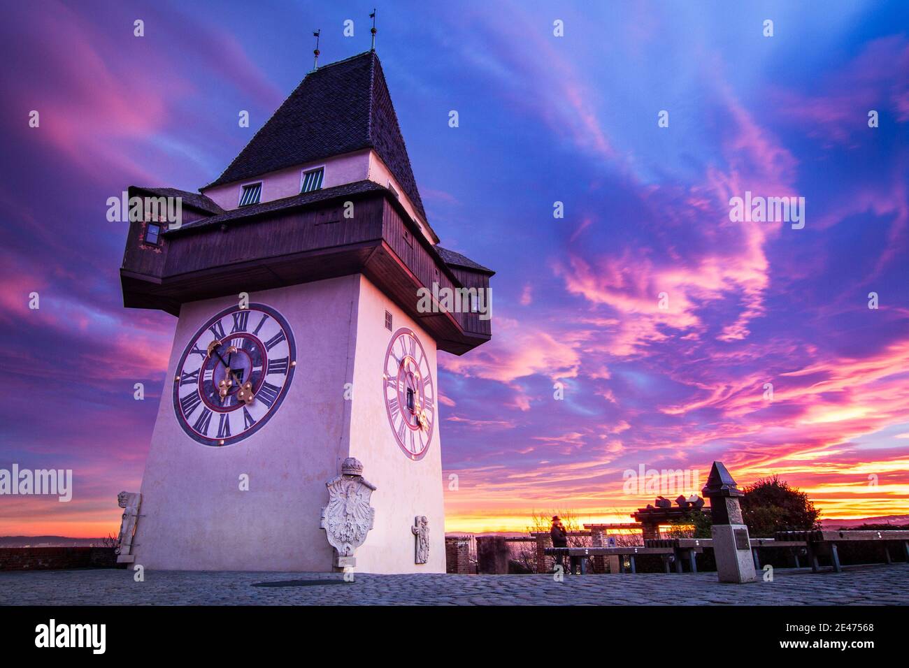 The famous clocktower as a landmark of the city of Graz Stock Photo