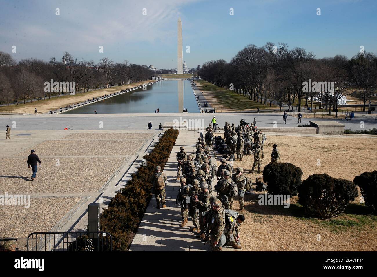 Washington, United States. 21st Jan, 2021. Florida National Guardsmen stand on guard around the Lincoln Memorial on the National Mall. According to news sources neither the FBI nor Homeland Security made an announcement regarding lowering the present security level around the US Capitol and downtown Washington DC. Credit: SOPA Images Limited/Alamy Live News Stock Photo