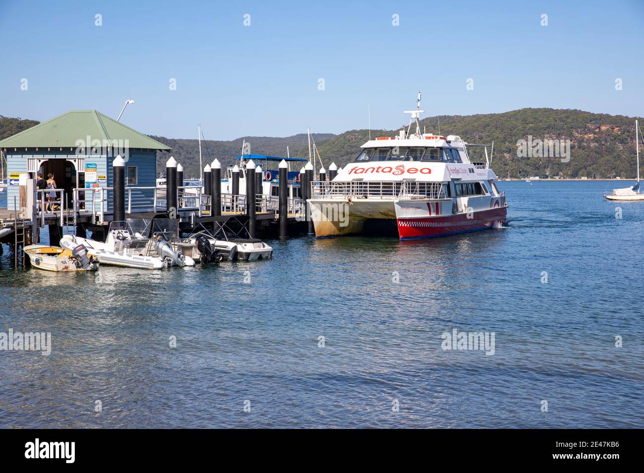 Palm Beach ferry wharf on Pittwater and Fantasea ferry cruiser awaiting passengers,Sydney,Australia Stock Photo