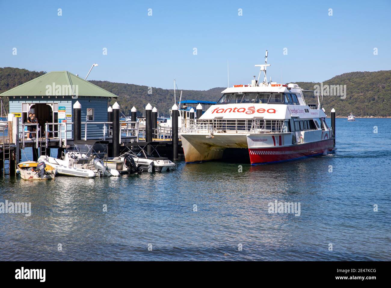 Palm Beach ferry wharf on Pittwater and Fantasea ferry cruiser awaiting passengers,Sydney,Australia Stock Photo