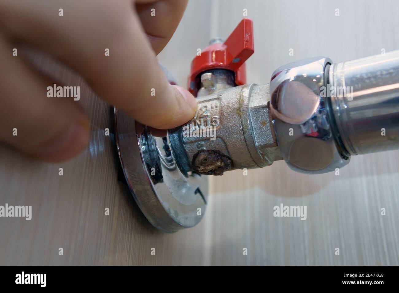metal faucet in the bathroom Metal corrosion. old plumbing rust Stock
