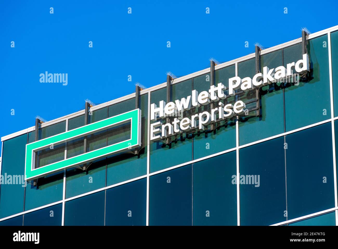 Hewlett Packard Enterprise sign, logo on headquarters building of